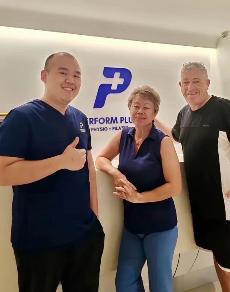 3 people standing in front of clinic